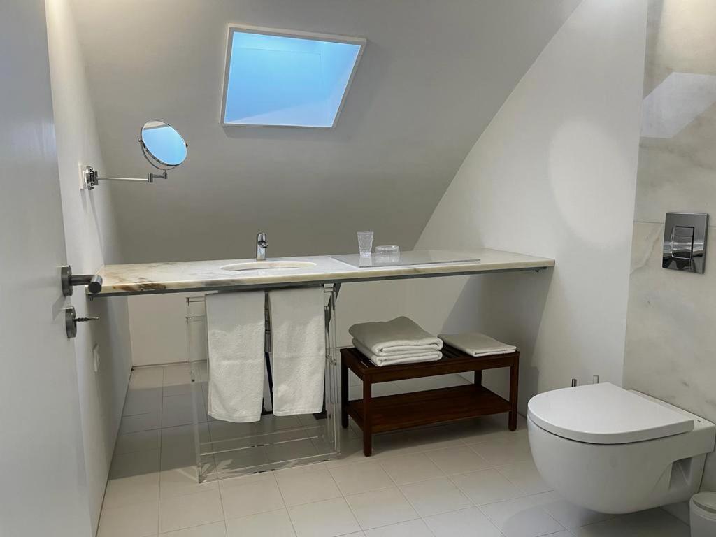 Signature Guesthouse Porto Quarto foto